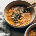 Spicy Peanut Soup with Sweet Potato + Kale