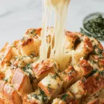 Cheesy Pull-Apart Garlic Bread with herbs