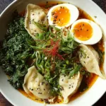 Savory Dumpling Ramen Bowl with Soft-Boiled Eggs and Fresh Greens