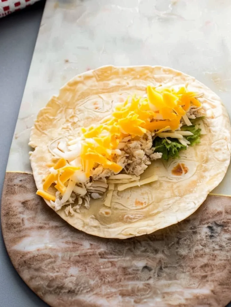 Chicken Enchiladas with Sour Cream White Sauce