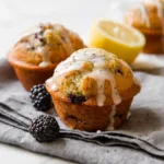 Lemon Poppy Seed Cupcakes with Blackberry Frosting